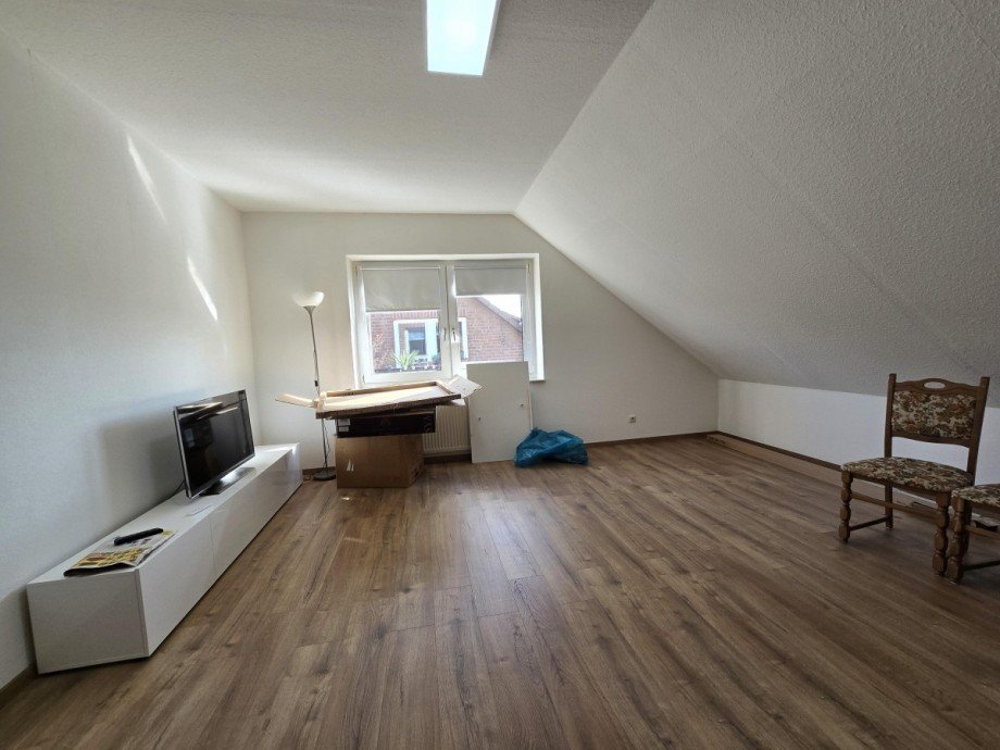 Wohnzimmer Dachgeschosswohnung Sassenburg