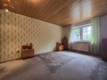 Schlafzimmer WE1 Top-Angebot in Triangel: Bungalow mit Einliegerwohnung und Garage