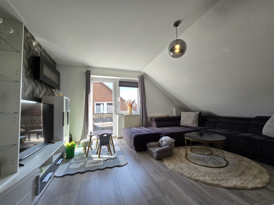 Wohnzimmer a Mehrfamilienhaus Sassenburg