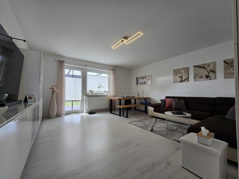 Wohnzimmer c Mehrfamilienhaus Sassenburg